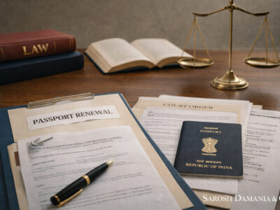 Legal documents, passport application file, scales of justice and law books representing passport renewal rights in India – Sarosh Damania & Co.